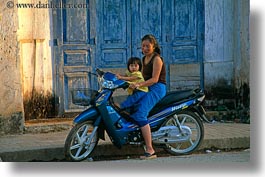 asia, blues, childrens, daughter, horizontal, laos, luang prabang, mothers, motorcycles, people, photograph