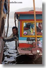 asia, boats, laos, luang prabang, men, parking, people, vertical, photograph