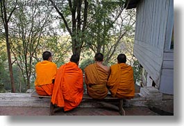 asia, asian, backs, colors, horizontal, laos, luang prabang, men, monks, oranges, people, sitting, photograph