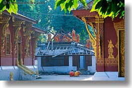 asia, asian, buildings, colors, horizontal, laos, luang prabang, men, monks, oranges, people, roofs, photograph