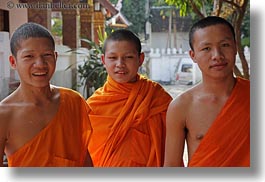 asia, asian, boys, colors, horizontal, laos, luang prabang, men, monks, oranges, people, portraits, threes, photograph