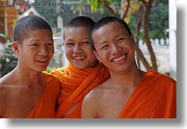 asia, asian, boys, colors, horizontal, laos, luang prabang, men, monks, oranges, people, portraits, threes, photograph