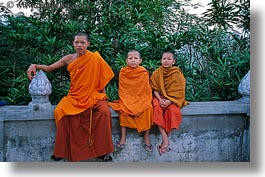 asia, asian, boys, colors, horizontal, laos, luang prabang, men, monks, oranges, people, threes, young, photograph