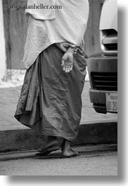 asia, asian, black and white, hands, helping, laos, luang prabang, men, monks, people, procession, vertical, photograph