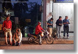 asia, cameras, horizontal, laos, luang prabang, monks, motorcycles, people, photographers, procession, transportation, waiting, photograph