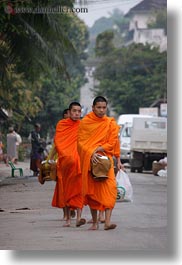 asia, asian, colors, laos, luang prabang, men, monks, oranges, people, procession, vertical, walking, photograph