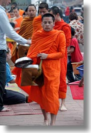 asia, asian, colors, laos, luang prabang, men, monks, oranges, people, procession, vertical, walking, photograph