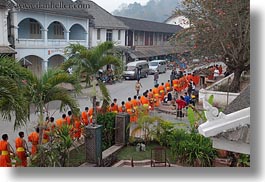 asia, asian, colors, horizontal, laos, luang prabang, men, monks, oranges, people, procession, walking, photograph