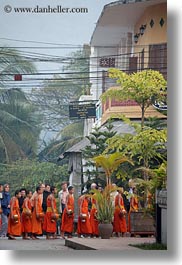 asia, asian, colors, laos, luang prabang, men, monks, oranges, people, procession, vertical, walking, photograph