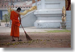 asia, asian, colors, horizontal, laos, luang prabang, men, monks, oranges, people, singles, sweeping, photograph