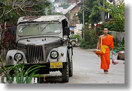 asia, asian, colors, horizontal, jeep, laos, luang prabang, men, monks, oranges, people, singles, walking, photograph