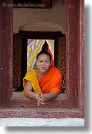 asia, asian, colors, laos, luang prabang, men, monks, oranges, people, singles, vertical, windows, photograph