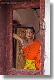 asia, asian, colors, laos, luang prabang, men, monks, oranges, people, singles, vertical, windows, photograph