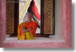 asia, asian, colors, horizontal, laos, luang prabang, men, monks, oranges, people, singles, windows, photograph