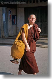 alms, asia, asian, container, laos, luang prabang, men, monks, people, singles, vertical, walking, worried, photograph