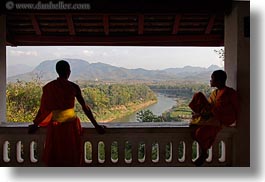 asia, asian, colors, horizontal, laos, luang prabang, men, monks, oranges, overlooking, people, rivers, silhouettes, two, photograph