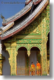 asia, asian, colors, laos, luang prabang, men, monks, oranges, palace, people, temples, two, vertical, photograph