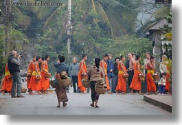 asia, asian, colors, don ganh, horizontal, laos, luang prabang, men, monks, oranges, people, walking, womens, photograph