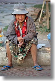 asia, asian, clothes, hats, laos, luang prabang, old, people, sitting, vertical, womens, photograph