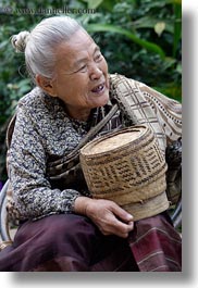 asia, asian, baskets, emotions, laos, luang prabang, old, people, rice, smiles, vertical, womens, photograph