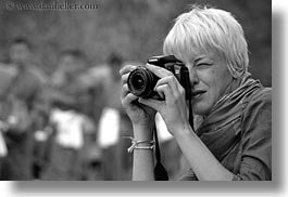 images/Asia/Laos/LuangPrabang/People/Women/Misc/woman-photographing-monks-01-bw.jpg