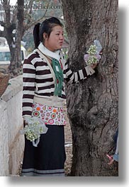 asia, asian, corsage, flowers, laos, luang prabang, people, vertical, white, womens, photograph