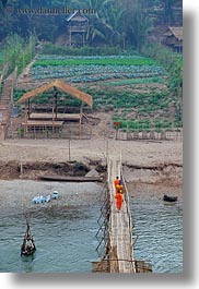 agriculture, asia, bamboo, bridge, buildings, crossing, huts, laos, luang prabang, materials, monks, nature, rivers, scenics, structures, vertical, water, photograph
