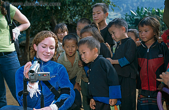 tourist-showing-video-to-children.jpg