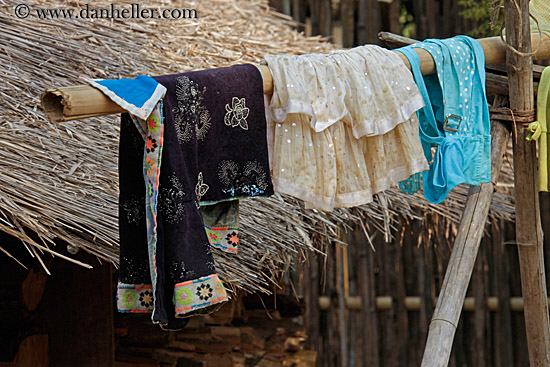 thatched-hut-w-hanging-laundry-4.jpg