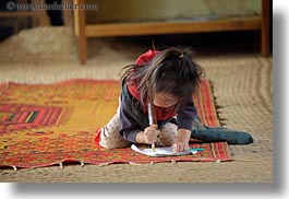 asia, buildings, classroom, girls, hmong, horizontal, laos, paper, pencil, rugs, school, structures, villages, photograph