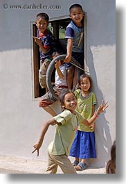 asia, asian, childrens, emotions, groups, laos, laugh, people, playing, river village, smiles, vertical, villages, windows, photograph