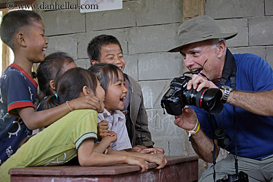 man-showing-camera-to-kids-2.jpg