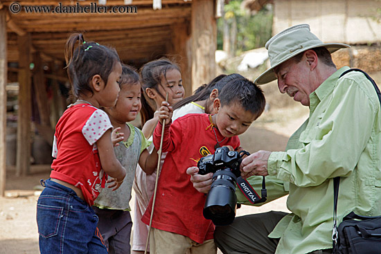 man-showing-camera-to-kids-3.jpg