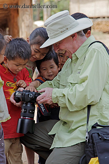 man-showing-camera-to-kids-6.jpg