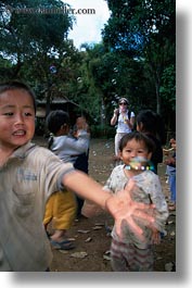 asia, asian, bubbles, childrens, emotions, laos, people, playing, poverty, river village, smiles, vertical, villages, photograph