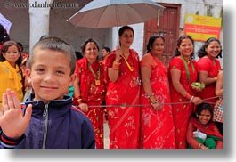 images/Asia/Nepal/Kathmandu/Pashupatinath/Men/boy-waving-by-girls-in-line.jpg
