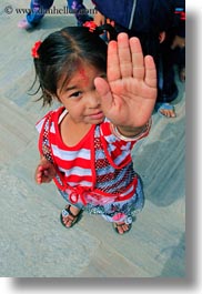 asia, downview, girls, hindu, kathmandu, nepal, pashupatinath, perspective, religious, shirts, sindoor, striped, tikka, vertical, womens, photograph