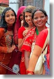asia, bindi, earrings, emotions, girls, groups, hindu, jewelry, kathmandu, nepal, pashupatinath, people, religious, sindoor, smiles, stud, teenagers, tikka, vertical, womens, photograph