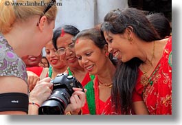 asia, bindi, cameras, emotions, girls, hindu, horizontal, jewelry, kate, kathmandu, nepal, pashupatinath, people, religious, showing, sindoor, smiles, stud, teenagers, tikka, womens, photograph