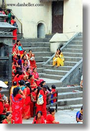 images/Asia/Nepal/Kathmandu/Pashupatinath/Women/woman-in-yellow-on-stairs-01.jpg