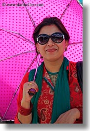 images/Asia/Nepal/Kathmandu/Pashupatinath/Women/woman-w-umbrella-02.jpg