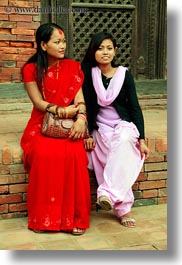 asia, earrings, emotions, girlfriends, girls, hindu, jewelry, kathmandu, nepal, patan darbur square, people, religious, sindoor, smiles, teenagers, tikka, vertical, womens, photograph