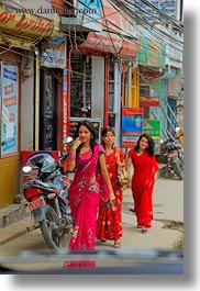 asia, emotions, girls, hindu, kathmandu, nepal, patan darbur square, people, religious, sindoor, smiles, teenagers, tikka, vertical, walking, womens, photograph