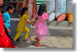 asia, childrens, girls, horizontal, kathmandu, nepal, patan darbur square, people, walking, womens, photograph