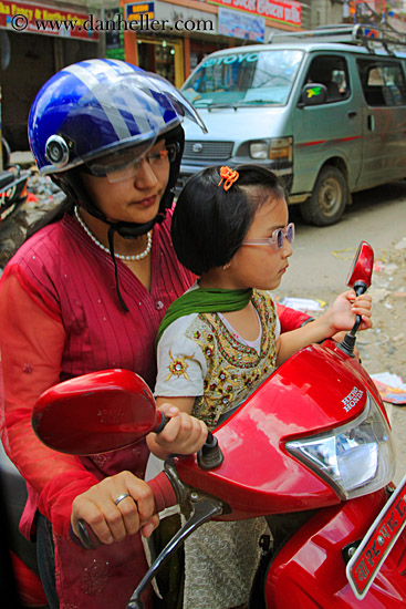 mother-n-daughter-on-moped.jpg