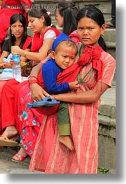 asia, babies, earrings, hindu, jewelry, kathmandu, mothers, nepal, patan darbur square, religious, sindoor, stud, tikka, vertical, womens, photograph
