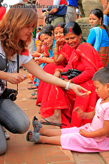 photographer-woman-feeding-child.jpg
