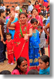 asia, bindi, dancing, earrings, emotions, hindu, jewelry, kathmandu, nepal, patan darbur square, religious, rings, sindoor, smiles, stud, tikka, vertical, womens, photograph