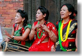 asia, bindi, earrings, emotions, friends, hindu, horizontal, jewelry, kathmandu, laugh, necklace, nepal, patan darbur square, religious, sindoor, smiles, stud, tikka, womens, photograph