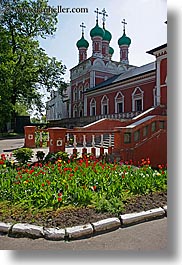 asia, buildings, churches, crosses, domed, flowers, green, monestaries, moscow, nature, onion dome, religious, russia, steeples, structures, tulips, vertical, photograph